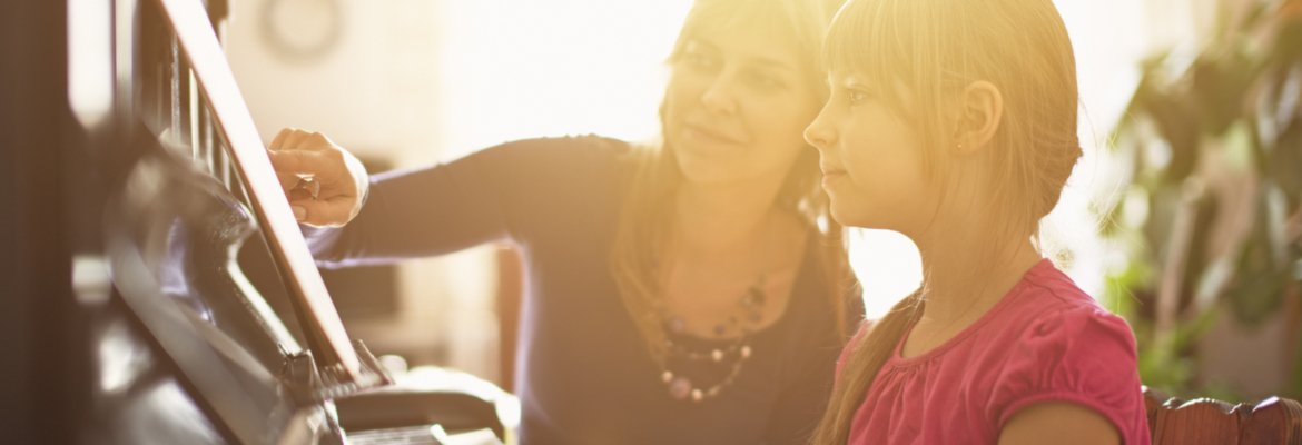 Piano student with her Private Piano Instructor
