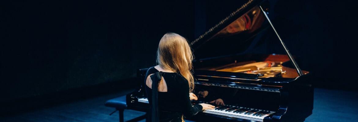 woman playing the piano